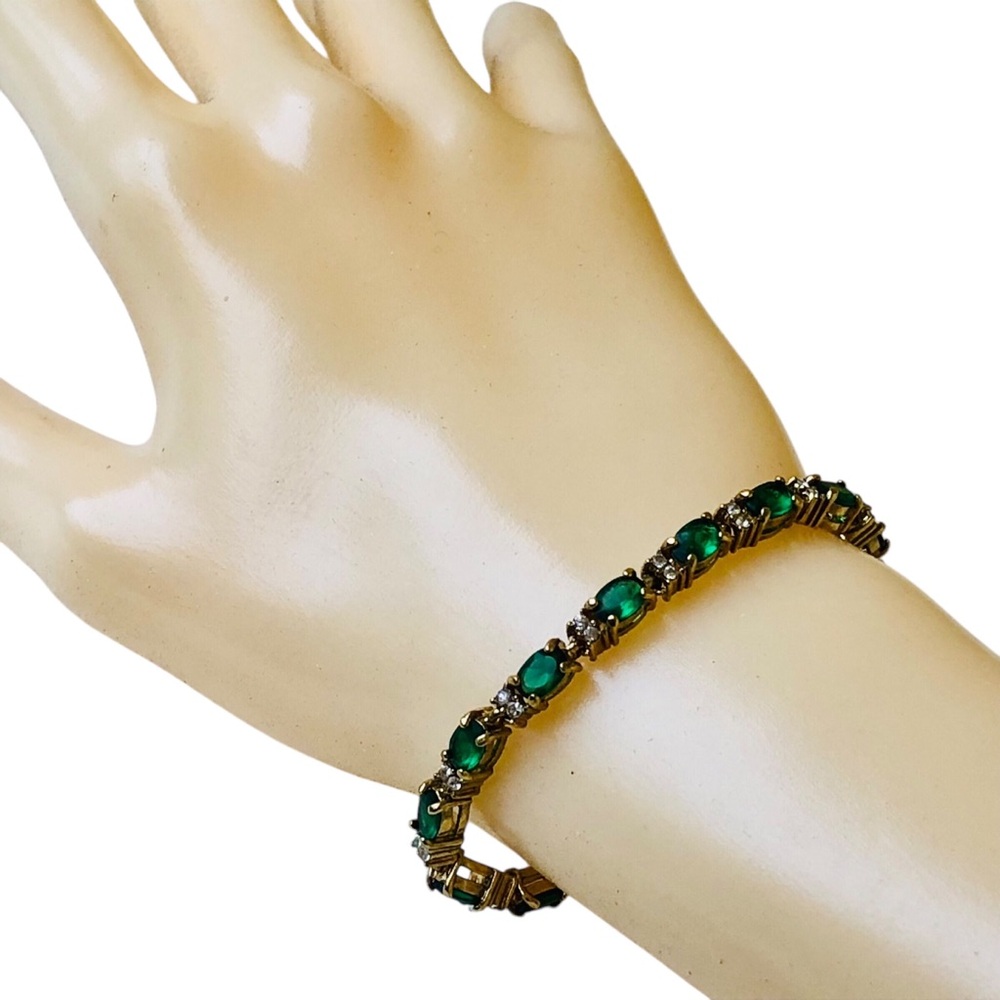 Avon Gold-tone Emerald Green Crystal Clear Rhinestone Bracelet